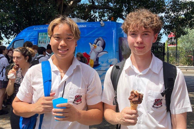 Year 12 studnts eating ice creams provided by the P&C.