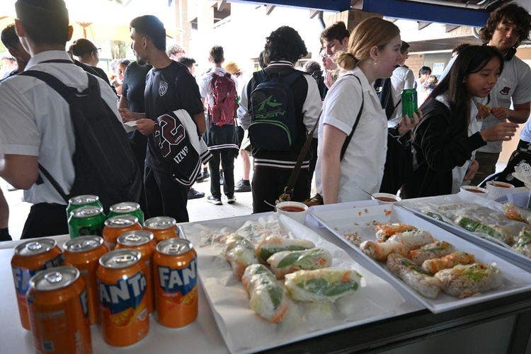 P&C serving food and drinks to Year 12 students celebrating the competition of their first HSC examination.